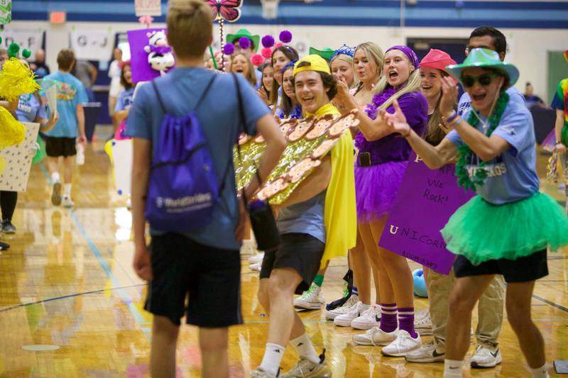 Downers Grove South freshmen enter the gym at the Mustang Mad Dash orientation on Saturday Aug.10, 2024 in Downers Grove.