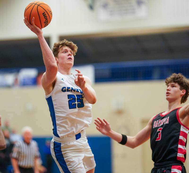Geneva’s Hudson Kirby (25) shoots the ball in the post against Batavia's Jax Abalos (3) during a basketball game at Geneva High School on Friday, Feb. 7, 2025.