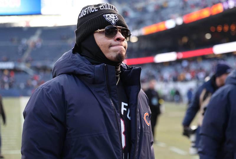 Chicago Bears quarterback Justin Fields walks off the field for the last time this season Sunday, Jan. 8, 2023, after their game against the Minnesota Vikings at Soldier Field in Chicago.