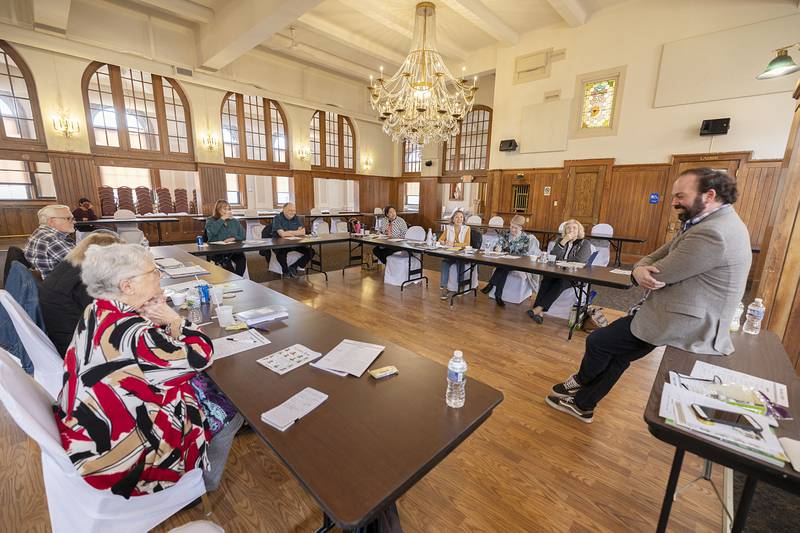 Lawler (right) explains the difference between and memoir and a life story. “A memoir makes a connection to the audience on a personal level.”