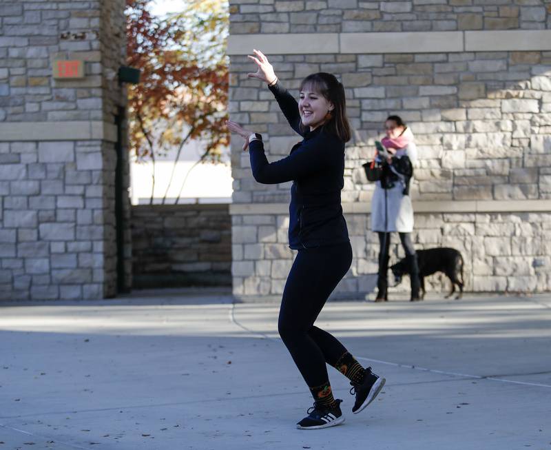 Aimee Frost teaches kids a dance routine during the Monster Mash Dance Party at Fishel Park in Downers Grove, Ill. on Saturday, October 29, 2022.