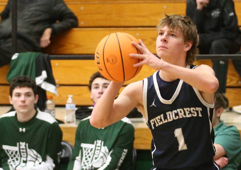 Fieldcrest's Eli Gerdes shoots a wide-open jump shot against Midland on Wednesday, Feb. 19, 2025 at Midland High School.