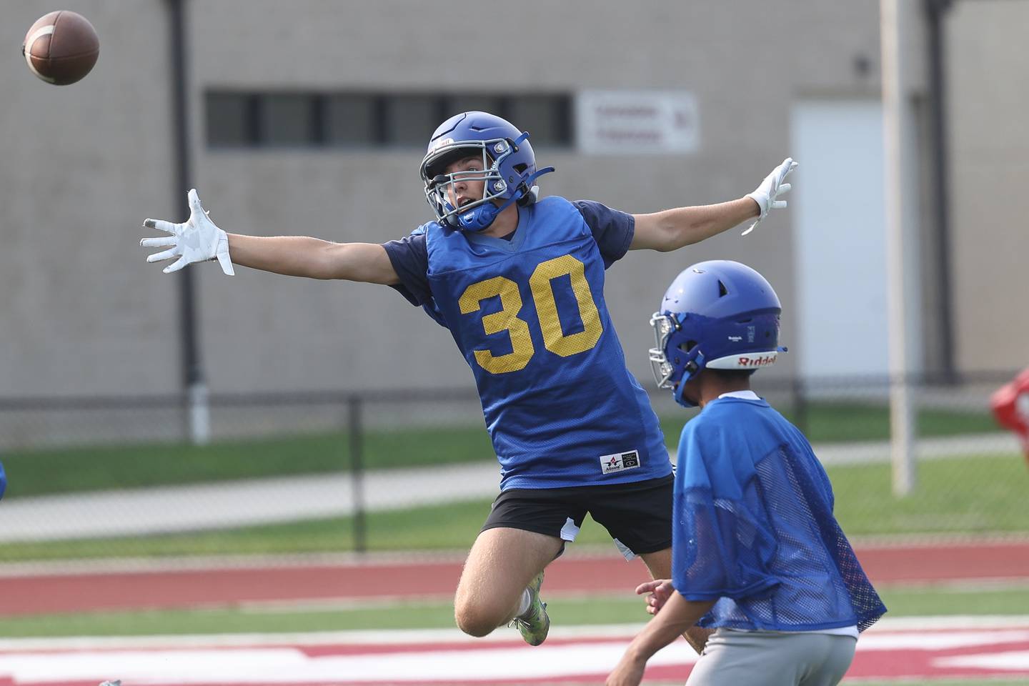 Joliet Central’s Jonas Gregory reaches for the wide pass at Morris’ 7 on 7 scrimmage on Tuesday, July 23, 2024.