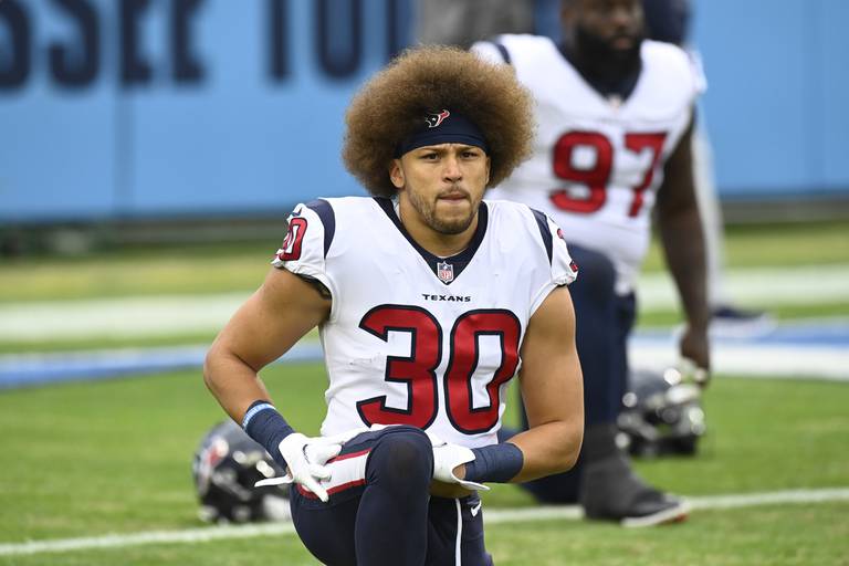 Houston Texans running back Phillip Lindsay warms up before a game against the Tennessee Titans on Nov. 21, 2021, in Nashville, Tenn.