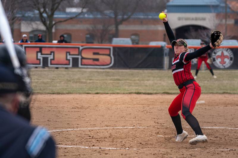 Yorkville's Madilyn Reeves (2) delivers a pitch against St.Charles East during a softball game at St.Charles East High School on Wednesday, Mar 22, 2023.