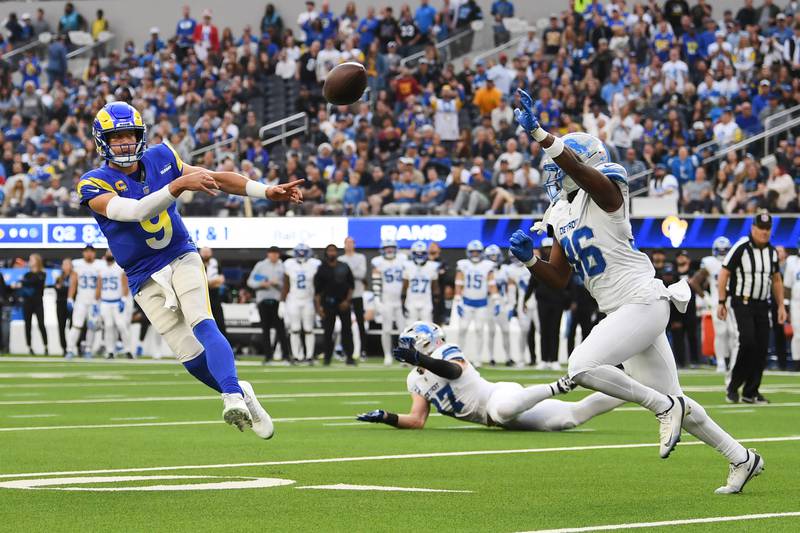 Los Angeles Rams quarterback Matthew Stafford (9) throws a pass during the first half of an NFL football game against the Detroit Lions, Sunday, Dec. 14, 2025, in Inglewood, Calif. (AP Photo/Katie Chin)