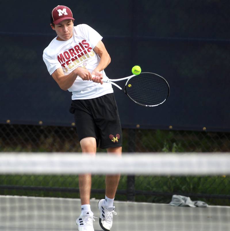 Connor Barth of Morris returns the ball during the first round of the 1A boys state tennis meet on Thursday, May 29. 2025 at Buffalo Grove High School.