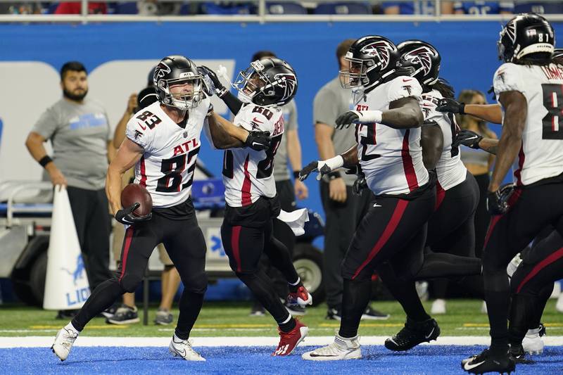 FILE - Atlanta Falcons wide receiver Jared Bernhardt (83) celebrates his touchdown catch against the Detroit Lions during a preseason NFL football game in Detroit, Friday, Aug. 12, 2022.  Just two years after being honored as the nation’s top college lacrosse player, Bernhardt is trying to make it as an NFL receiver with the Atlanta Falcons.  (AP Photo/Paul Sancya, File)