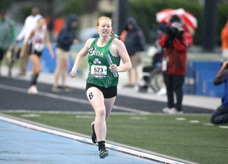 Seneca’s Emma Smith runs the anchor leg of the 1A 4x400 meter relay finals during the IHSA Girls State Championships in Charleston on Saturday, May 21, 2022.