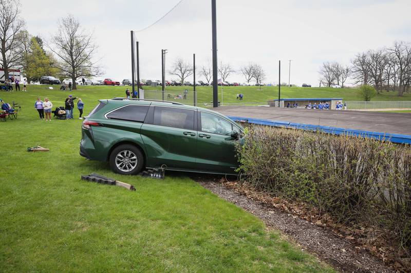 No pedestrians were injured and 3 children in the car suffered "minor to moderate" injuries when it hit a baseball dugout in Woodstock's Emricson Park Saturday morning.