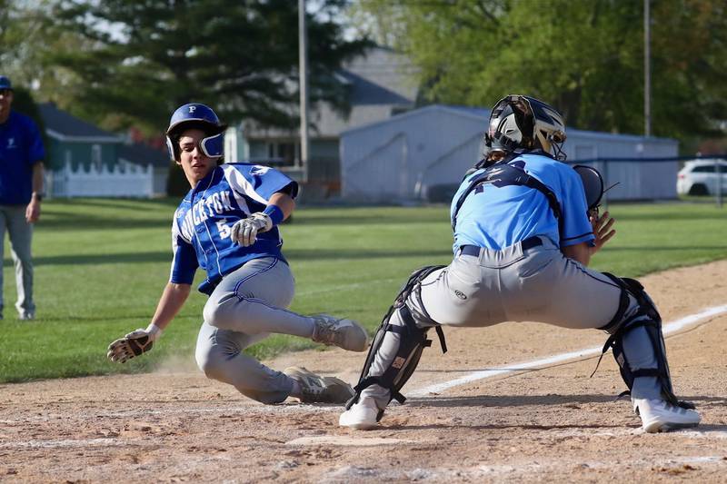 Princeton's Ace Christiansen beats the throw home to Bureau Valley catcher Sam Wright Thursday at Prather Field.