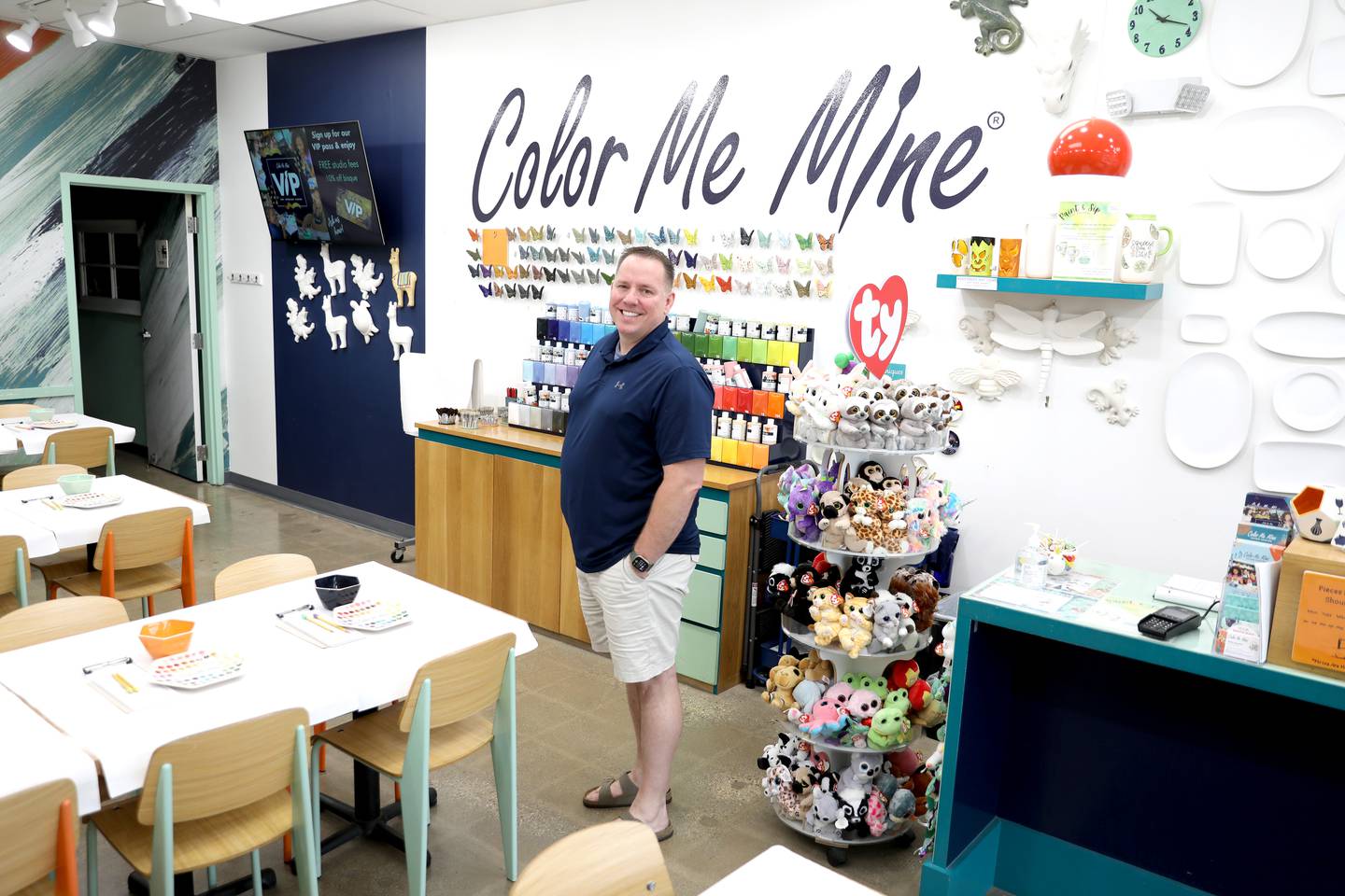 U.S. Navy veteran Jason Stucky now owns the Color Me Mine pottery studio in Geneva.