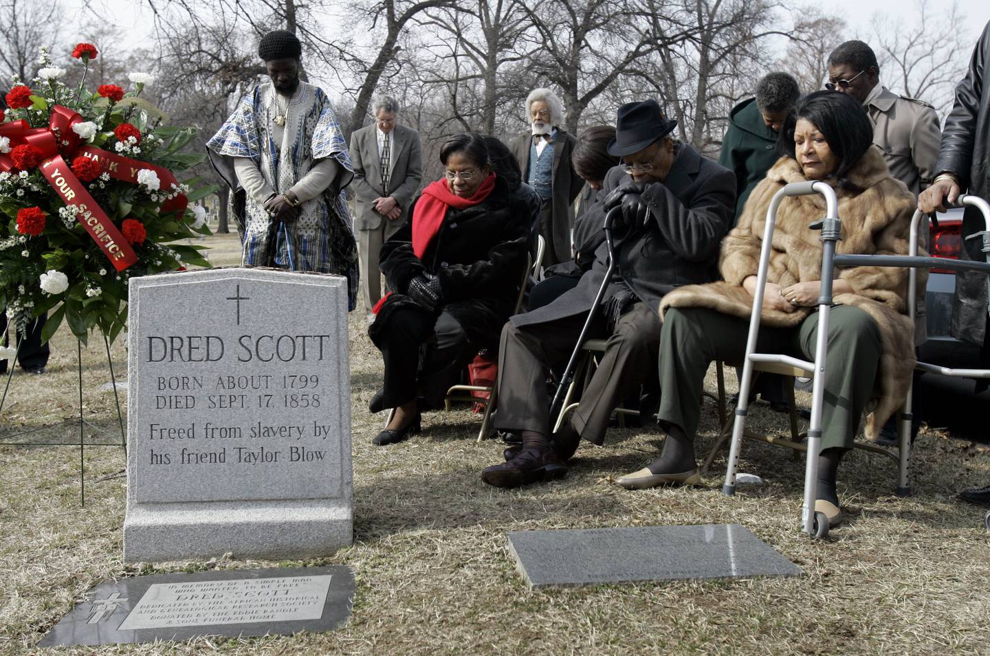 Descendants of Dred Scott and others gather at his grave site on March 6, 2007, at Calvary Cemetery in St. Louis, Mo. The gathering marked the 150th anniversary of the U.S. Supreme Court's decision to deny slave Dred Scott his freedom.