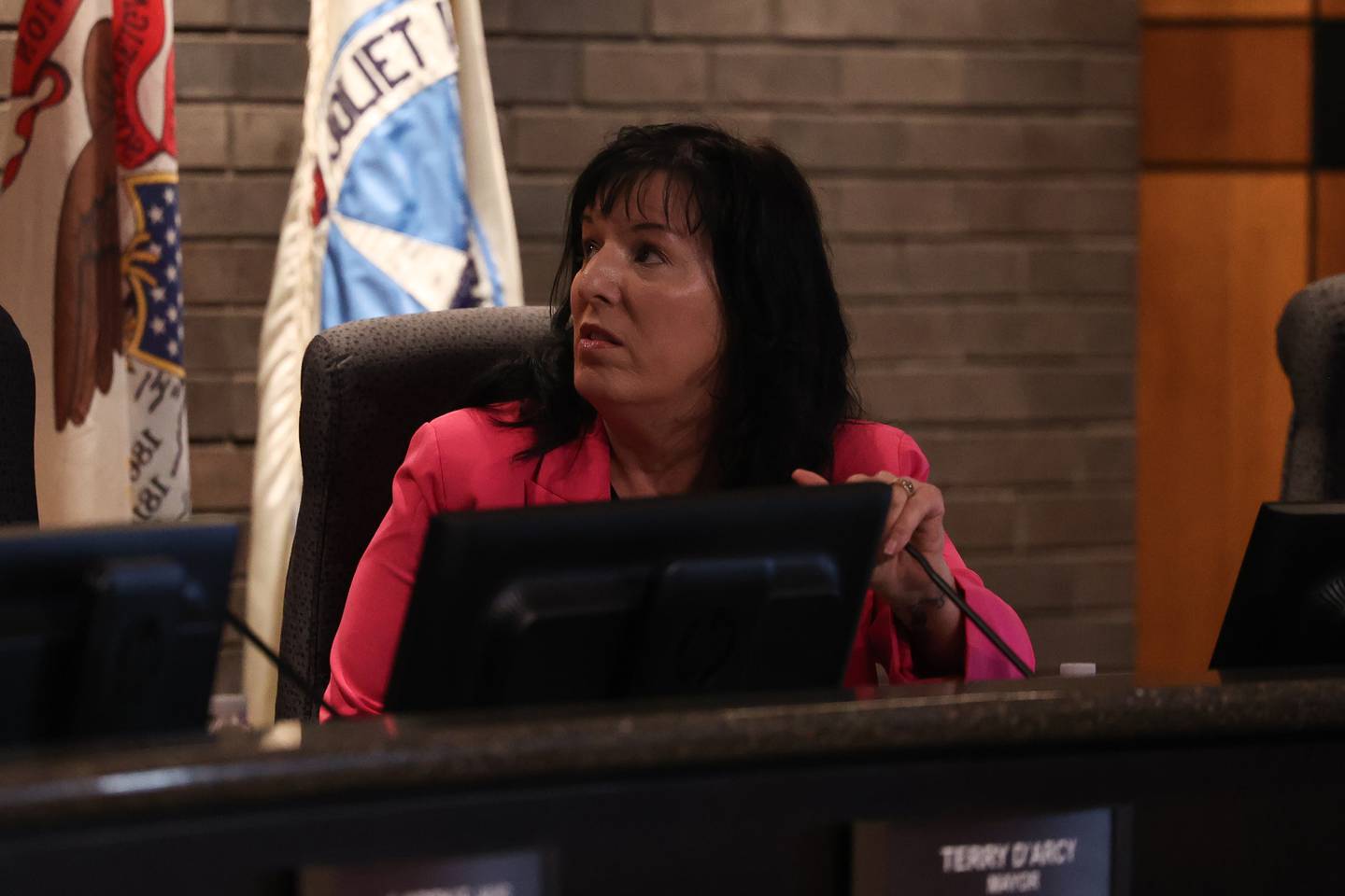 Joliet City Council member Suzanna Ibarra has a conversation before the start of the Joliet City Council meeting on Tuesday, July 18th, 2023.