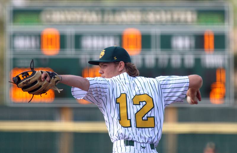 Crystal Lake South’s Mark Pachla makes an offering against Lake Forest in Class 3A baseball regional action at Crystal Lake Thursday.