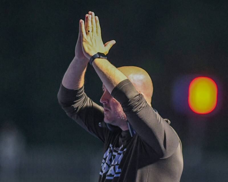 Joliet Catholic Academy’s Head Coach Jake Jaworksi tries to argue that a St. Francis’s player was in the endzone when tackled for a safety during the second quarter on Friday Sep. 22, 2023, while traveling to take on St. Francis in Wheaton.
