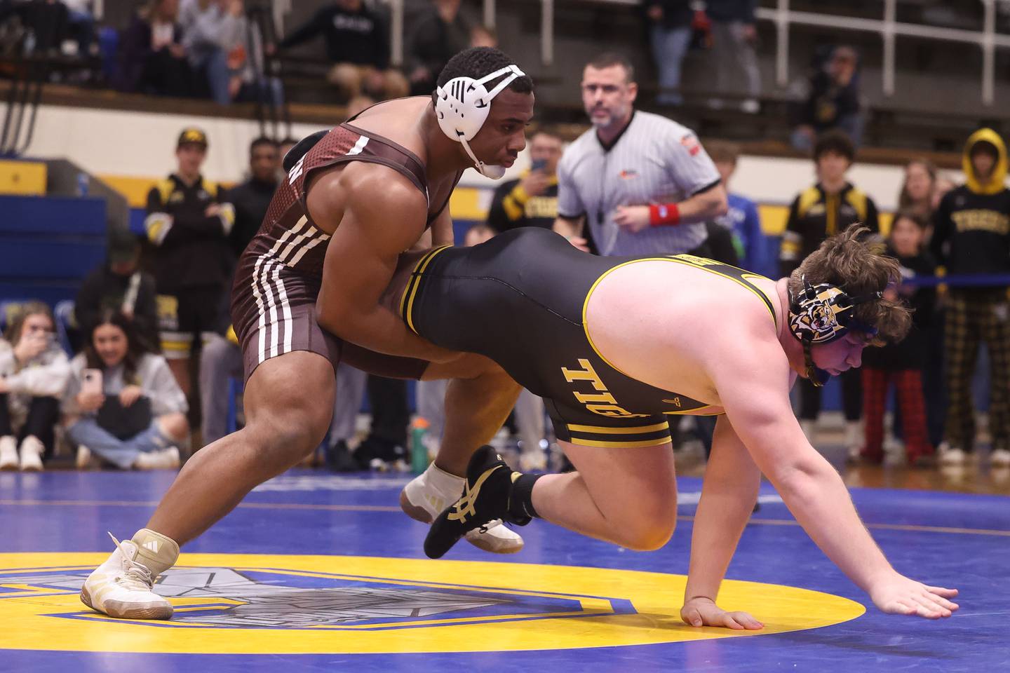 Joliet Catholic’s Dillan Johnson drops Joliet West’s Wyatt Schmitt in the Class 3A Joliet Central Regional 285 pound Championship match on Saturday, Feb. 3rd 2024 in Joliet.