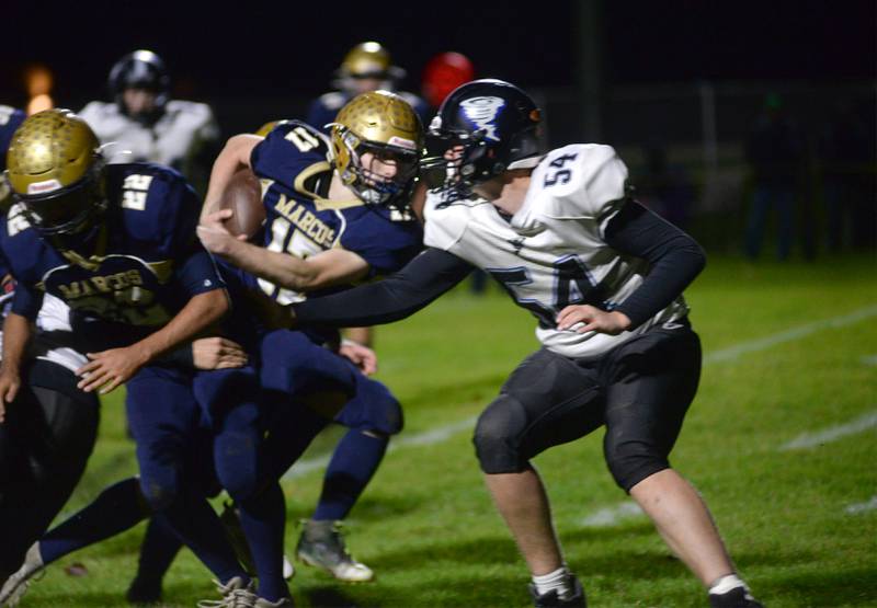 Polo's Brock Soltow (17) leans into the endzone against West Prairie during 8-man football playoff action on Friday, Oct.27, 2023 at Polo High School.