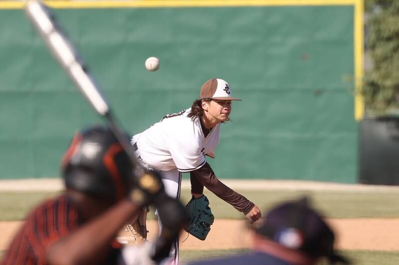 Joliet Catholic’s Michael Tuman delivers a pitch against Leo in the Class 2A sectional semifinal on Thursday, May 25, 2023, in Joliet.