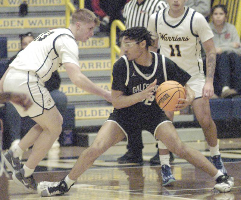 Sterling's Aiden Lacy and Galesburgs Rahkim Mccellan battle for the basketball. Sterling Boys Basketball hosted Galesburg at Musgrove Fieldhouse on February 11, 2025.