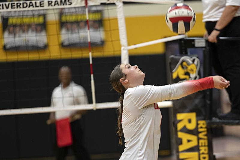 Oregon’s Anna Stender plays a shot against Rock Falls Tuesday, Oct. 24, 2023 at the Riverdale volleyball regional.