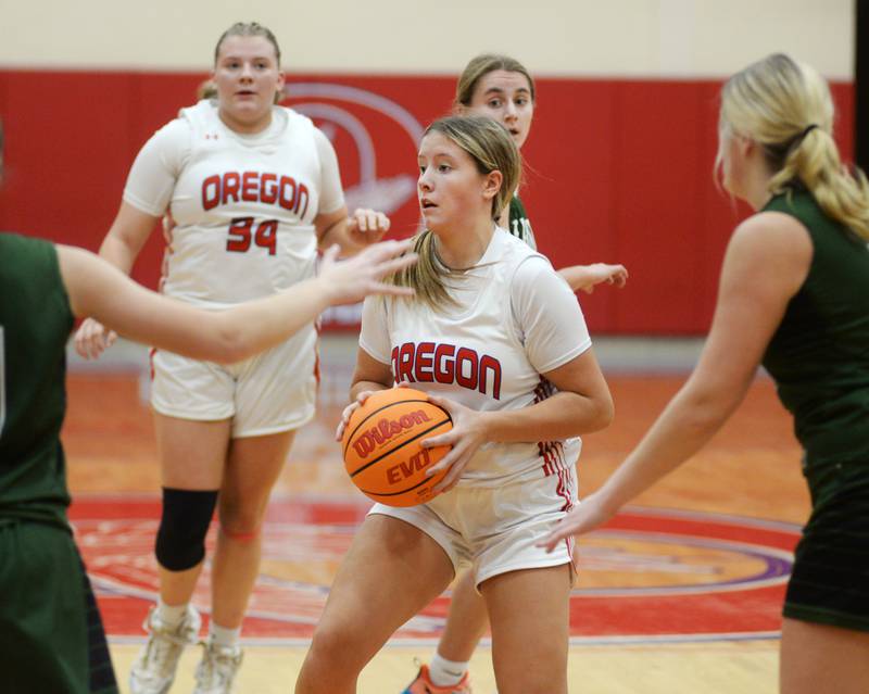 Oregon's Aniyah Sarver (23) holds the ball against West Carroll at the Oregon Girls Basketball Tip-Off Tournament on Wednesday, Nov. 20, 2024 at the Blackhawk Center in Oregon.