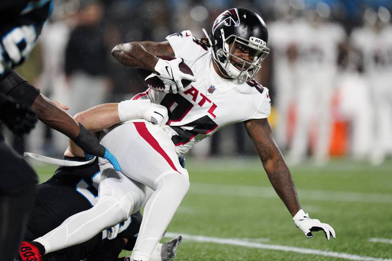 Atlanta Falcons running back Cordarrelle Patterson is tackled by Carolina Panthers linebacker Cory Littleton during the first half, Thursday, Nov. 10, 2022, in Charlotte, N.C.
