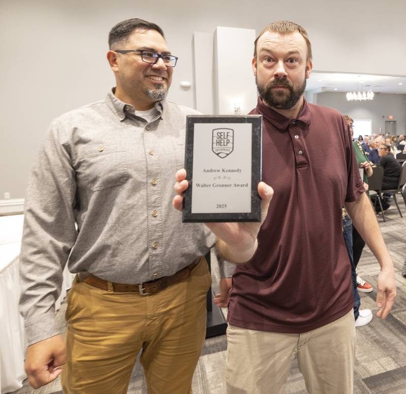 Andrew Kennedy shows off his Best Worker Award Thursday, Oct. 16, 2025, during the annual Self Help Awards.
