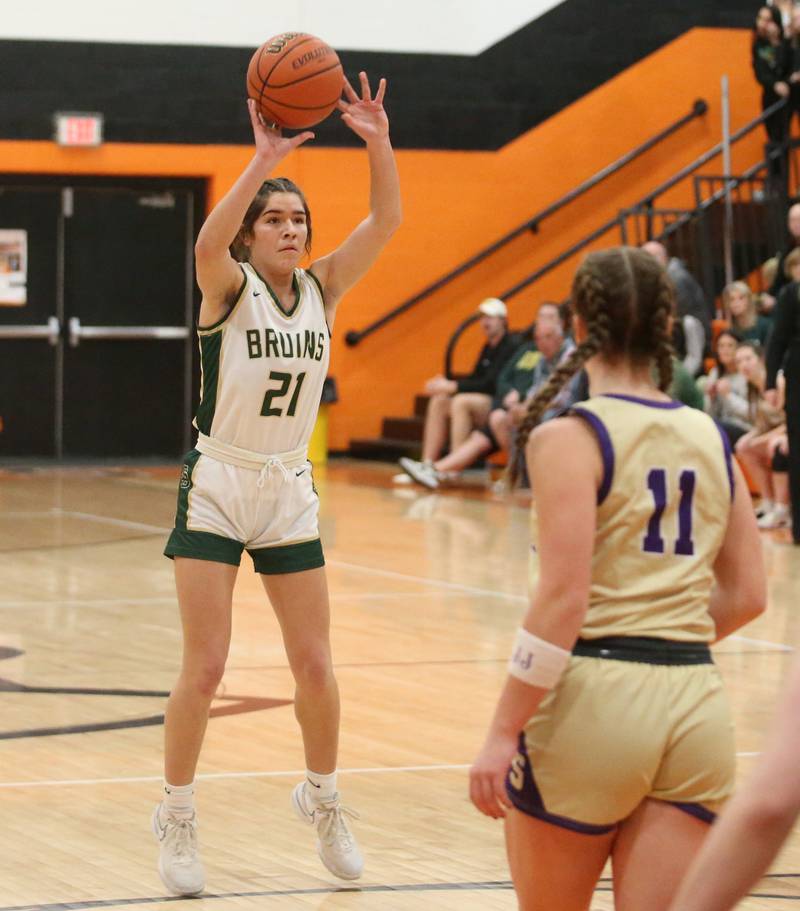St. Bede's Lily Bosnich shoots a shot over Serena's Rayelle Brennan during the Class 1A Sectional final game on Thursday, Feb. 22, 2024 at Gardner-South Wilmington High School.