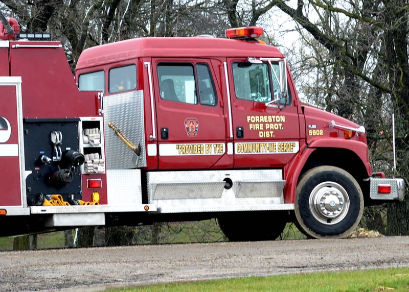 A Forreston fire truck waits to bring water in at a structure fire on Wednesday, April 3, 2024 at 2990 W,. Lightsville Road, northeast of Leaf River. The department will be receiving a $26,000 grant through the state fire marshal's office to purchase equipment.