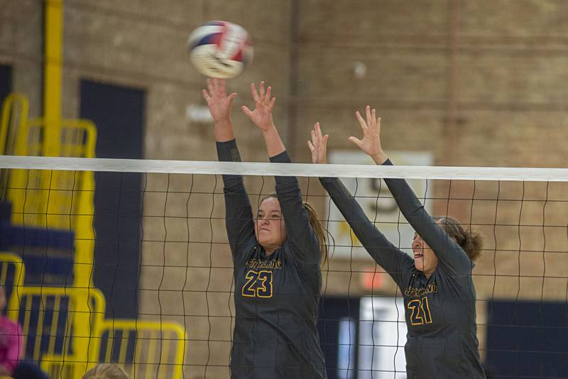 Sterling’s Sienna Stingley (left) and Sterling’s Kirra Gibson go up to block a shot Monday, Sept. 26, 2022 against Washington.