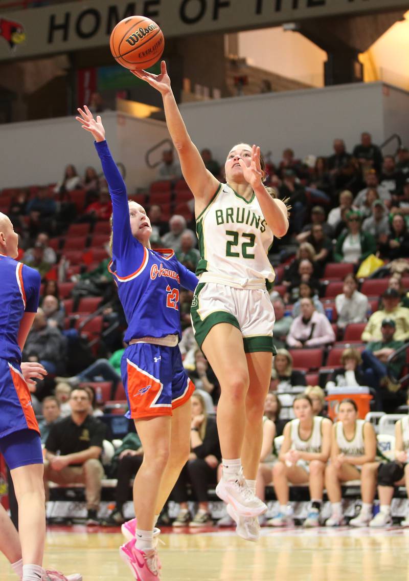 St. Bede's Ella Hermes lets go of a shot over Okawville's Raelyn Obermeier during the Class 1A State semifinal game on Thursday, Feb. 29, 2024 at CEFCU Arena in Normal.