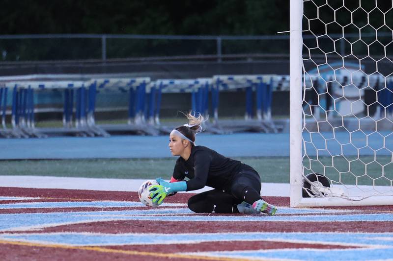 Kankakee's Ana Lopez makes a save during the Kays' 3-1 loss to Oak Forest in the IHSA Class 2A Kankakee Regional championship on Friday, May 23, 2025.