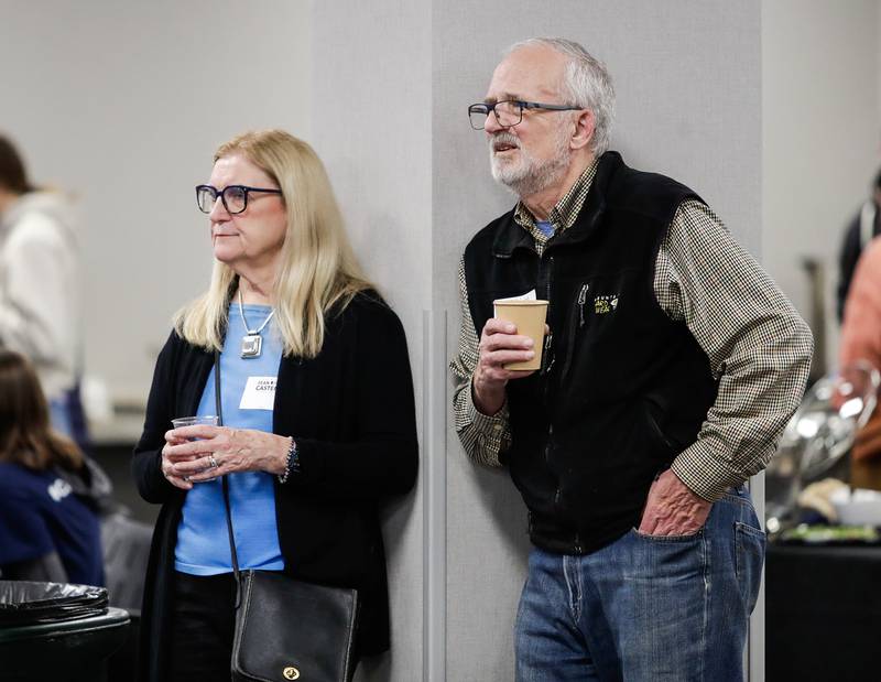 Denise and Joe Joyce of Hinsdale watch as election results come in during U.S. Rep. Sean Casten’s watch party at Chicagoland Laborers' District Council in Burr Ridge, Ill. on Tuesday, Nov. 8, 2022.