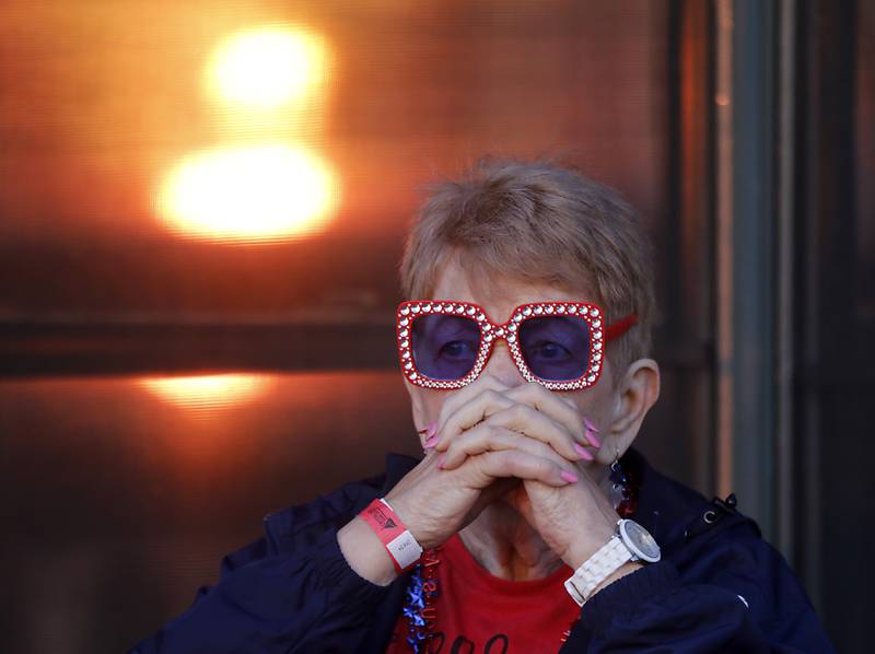 Diane Same of Crystal Lake watches as the sun sets before the fireworks show Sunday, July 2, 2023, at Crystal Lake’s Main Beach during Crystal Lake Annual Independence Day Celebration.