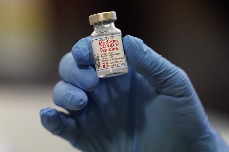FILE - This Tuesday, Jan. 5, 2021 file photo shows a vial of the Moderna COVID-19 vaccine at a pop-up vaccine clinic in Salt Lake City. U.S. regulators expect to rule Wednesday, Oct. 20, 2021 on authorizing booster doses of the Moderna and Johnson & Johnson COVID-19 vaccines, a Food and Drug Administration official said at a government meeting