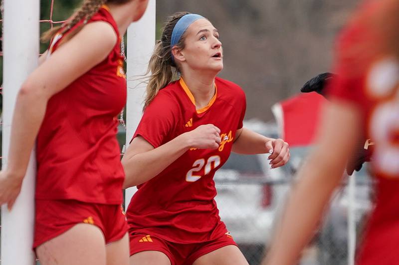Batavia’s Riley Bainter (20) helps to defend the goal during an Oswego East corner kick during a soccer match at Batavia High School on Saturday, March 29, 2025.