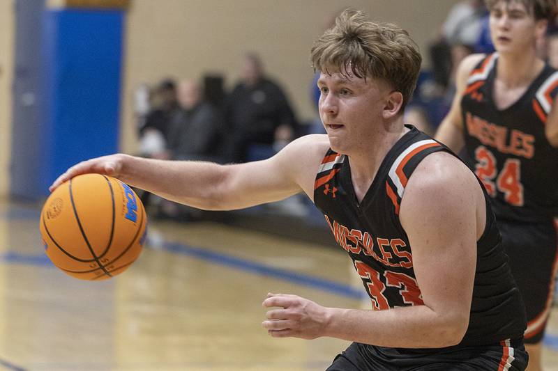 Milledgeville’s Karter Livengood looks to make a play against Newman Monday, Feb. 24, 2025, during a Class 1A Regional quarterfinal at Newman High School.