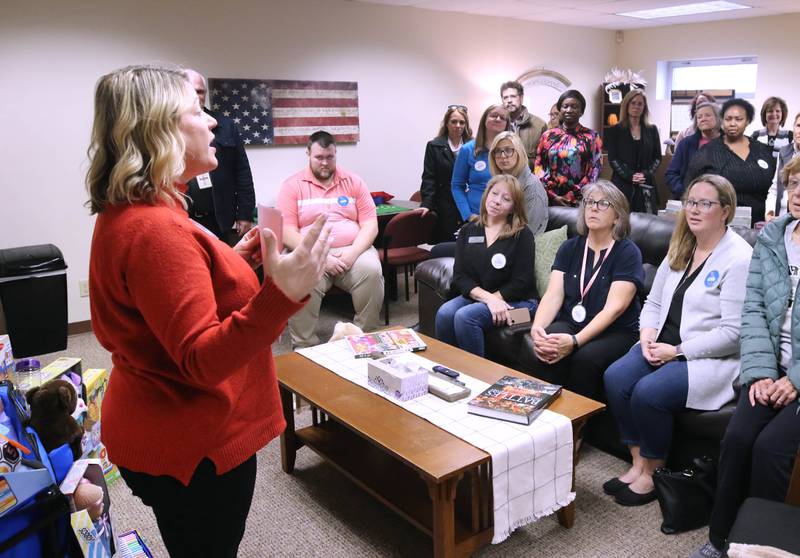 Tara Russo, executive director of Elder Care Services, speaks Wednesday, Nov. 20, 2024, during a ribbon cutting at their facility for their new Cozy Corner in DeKalb. Cozy Corner offers seniors a community space for socializing, learning and activities.