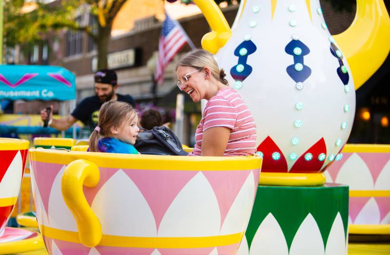 Heather Anfuso and her daughter Mila, 2, ride the teacups at The Taste of Westmont on Saturday, July 13.

Suzanne Tennant/For Shaw Local News Media
