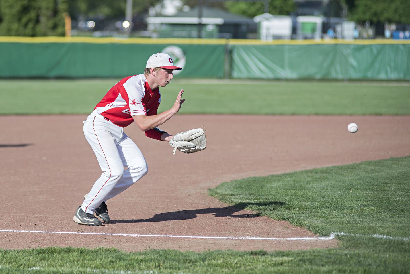 Oregon’s Gabe Eckerd fields a ball at third base Monday, May 16, 2022 against Rock Falls in the IHSA baseball quarterfinals.