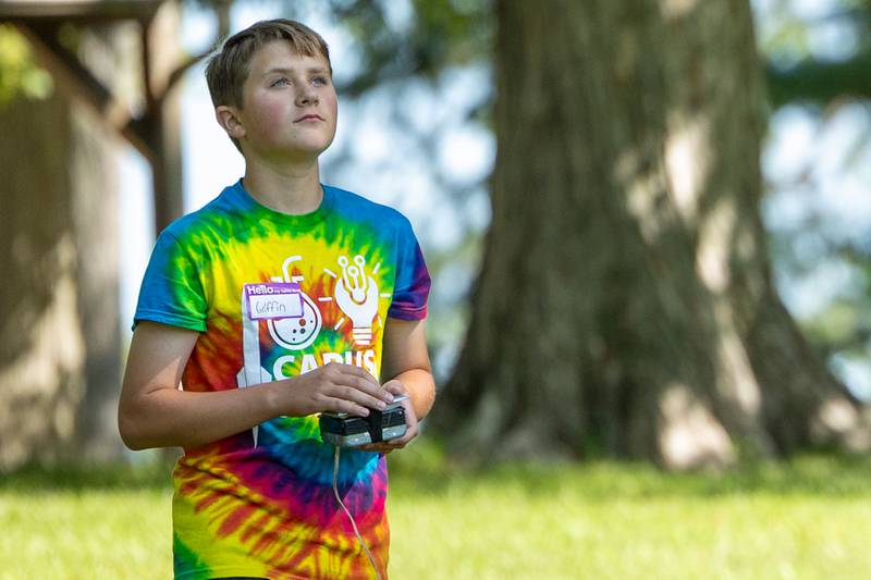 Griffin launches paper rocket during the 23rd annual Carus Summer Science Camp on Friday, July 18, 2025 at St. Bede High School in Peru.