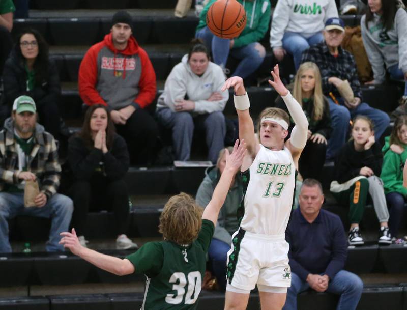 Seneca's Paxton Giertz shoots a jump shot over St. Bede's Kaden Newman during the Tri-County Conference Tournament on Tuesday, Jan. 23, 2024 at Putnam County High School.