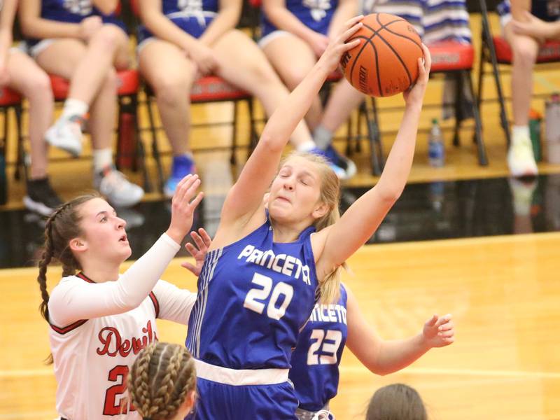 Princeton's Reese Reviglio grabs a rebound over Hall's Kennedy Wozniak on Thursday, Nov. 30, 2023 at Hall High School.