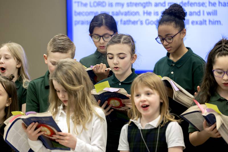 St. Andrew’s students serenade residents at Morningside of Sterling Thursday, Jan. 30, 2025. The school visited the living facility as part of a community outreach in celebration of Catholic Schools Week.