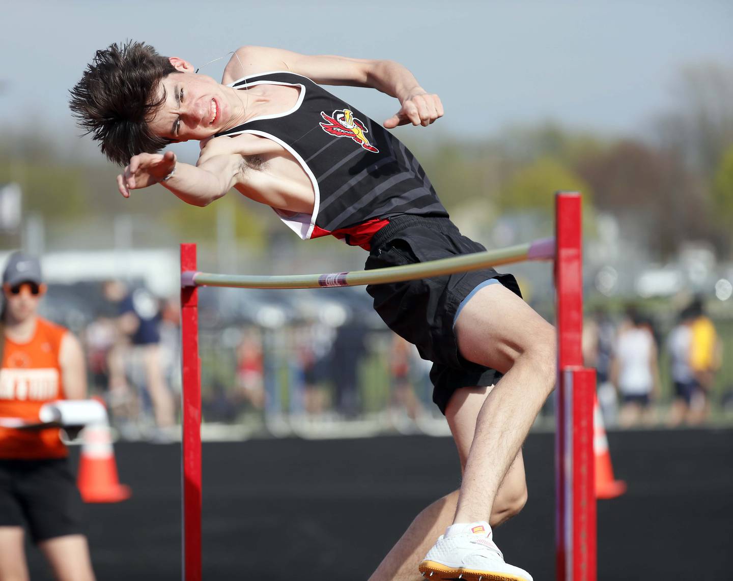 Ben Ferrel of Benet in the high jump during the 2023 Gus Scott Invitational Friday April 14, at Naperville North High School.