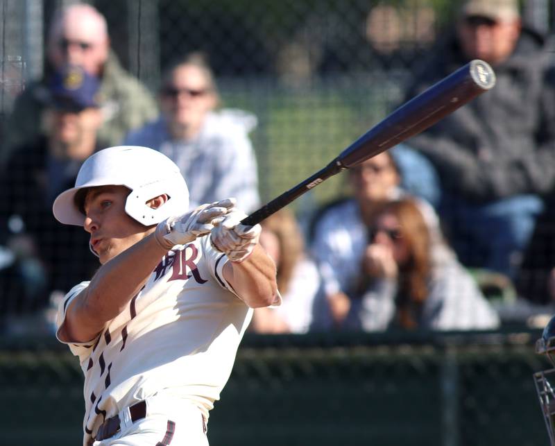 Prairie Ridge’s Tyler Vasey connects for a home run against Woodstock North in Class 3A Regional baseball action at Cary Thursday.
