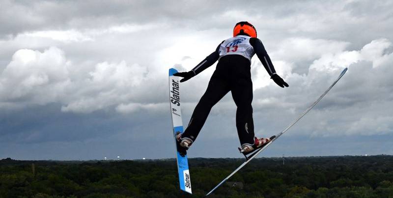 Isaac Larson, 14, of Negaunee, Michigan, makes a jump Sunday, Sept. 25, 2022, during the Norge Ski Club's annual Fall Ski Jumping Competition in Fox River Grove.