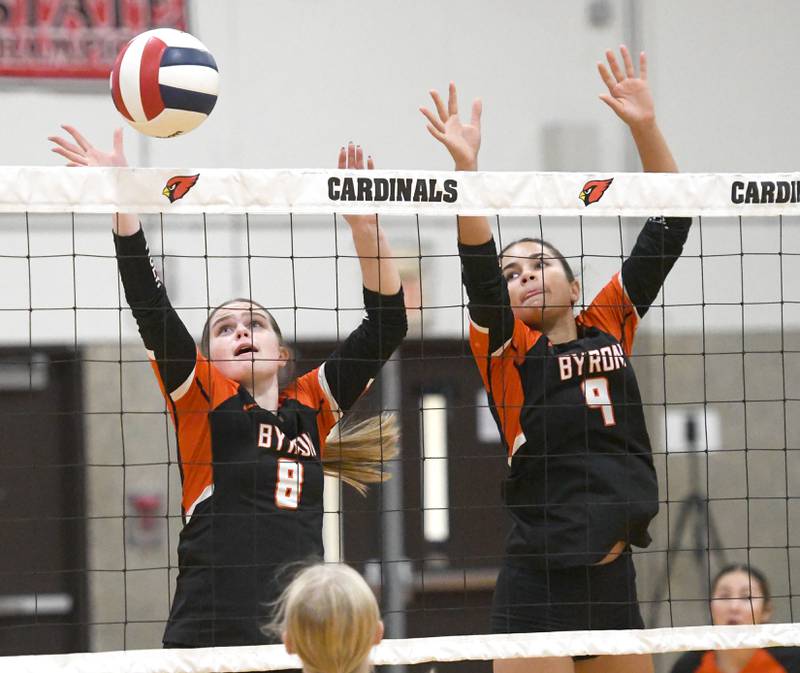 Byron's Molly Wheeler (8) and Celicia Johnson (9) block during a match at the Stillman Valley Tournament on Saturday, Oct. 25, 2025 at Stillman Valley High School.
