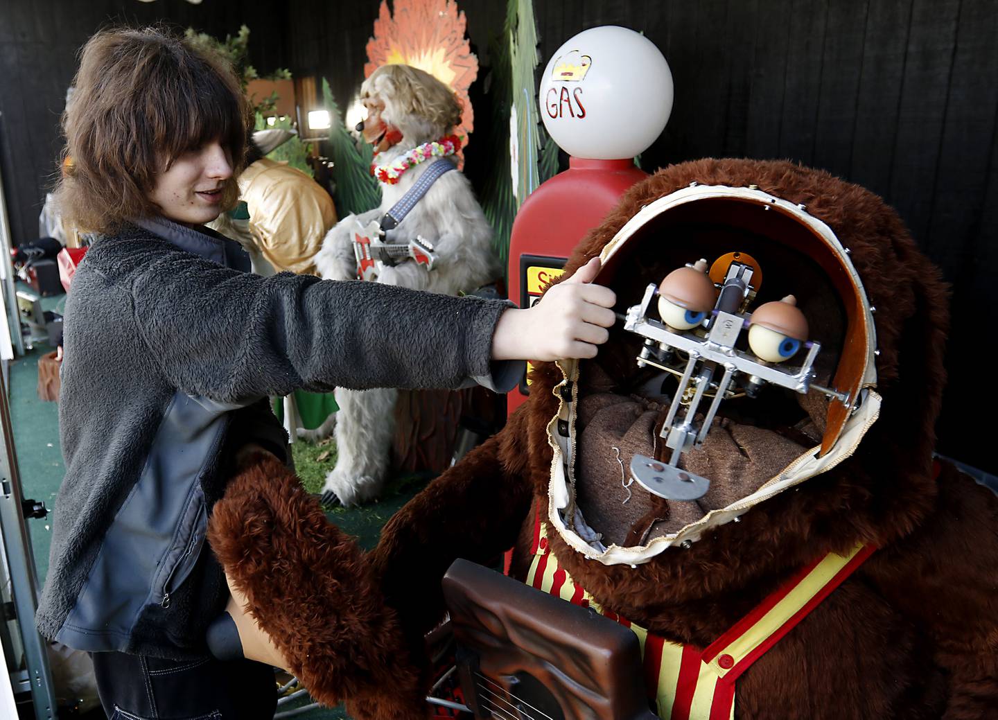 Rolan Fritz, of Indianapolis, works on bringing the Rock-afire animatronic band that formerly was a main attraction at Chuck E. Cheese restaurants back to life on Wednesday, March 27, 2024. So animatronic band can perform at the Volo Museum this summer.